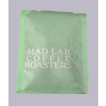 Green tote bag with the text "MAD LAB COFFEE ROASTERS"