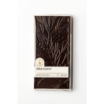 Bar of dark chocolate in a clear wrapper labeled salted caramel