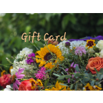 Mixed bouquet with sunflowers, roses, and daisies