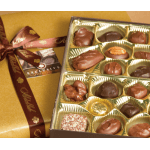 Box of assorted chocolates with a gold ribbon and gift wrap