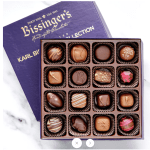 Box of assorted chocolates in a purple gift box
