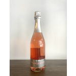 Bottle of pink sparkling wine with silver foil top