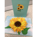 Paper sunflower craft with layered yellow and orange petals