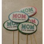 Four oval Mom picks with colorful lettering on sticks