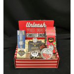 Gift box filled with assorted candy and chocolate packages
