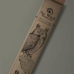 A boxed incense stick package with an owl illustration
