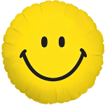 Yellow smiley face balloon on a white background