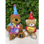 Two plush teddy bears wearing birthday hats and holding birthday gifts