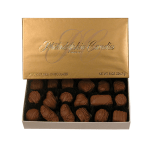 Box of assorted milk chocolates in a gold gift box