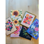Assorted floral greeting cards with birthday and sympathy messages