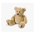 Plush teddy bear sitting on a white background