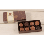 Box of assorted chocolates with the lid beside it