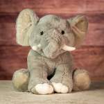 Plush gray elephant toy with white tusks and feet