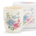 Cream ceramic mug with pastel flowers, butterflies, and the word Mom on the front