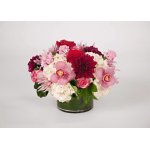 Pink and red flower arrangement in a glass vase