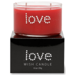 Red candle in a glass jar on a black box with "love" text