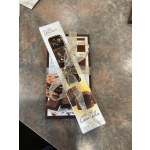 Two boxed chocolate bars tied with a sheer ribbon