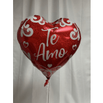 Red heart-shaped balloon with "Te Amo" text