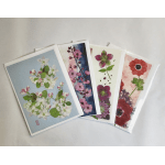 Four floral greeting cards with pressed flower designs