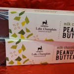 Two Lake Champlain Chocolates peanut butter bars in white wrappers