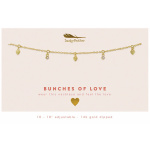 Gold charm necklace with small heart and crystal pendants on a cream card reading 'Bunches of Love'.