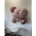 Cluster of pink birthday balloons with metallic rose-gold accents
