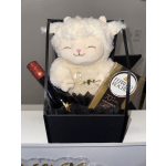 a lovely gift with a teddy bear and a variety of chocolates