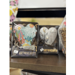 Gift box with a painted heart ornament and tassel