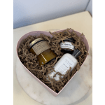 Heart-shaped gift box with candles, body lotion, and sugar scrub