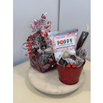 Gift basket with popcorn, chocolates, and a red metal bucket
