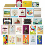Assorted colorful greeting cards arranged in a grid