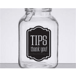 Clear glass tip jar with a "TIPS thank you!" label