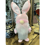 Pink plush bunny figurine with tall ears and a white beard