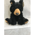 Black plush bear with tan snout and paw pads