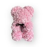 Pink rose teddy bear with a black ribbon bow