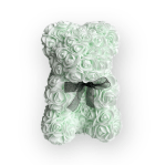 Mint green rose-shaped teddy bear with a black ribbon