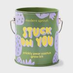 Green tin can labeled "Stuck on You" for a prickly pear cactus grow kit