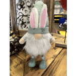 Small plush gnome with bunny ears, white beard, and mint clothing