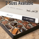Box of assorted chocolates with a white lid and black base