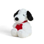 Plush dog holding a red heart