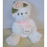 White teddy bear with a pink flower headband and heart that says MOM