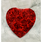 Heart-shaped box filled with red roses