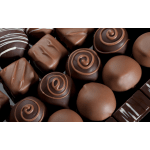 Assorted chocolate truffles and candies in a box