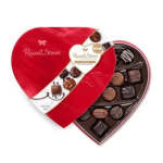 Heart-shaped box of assorted chocolates with a red lid
