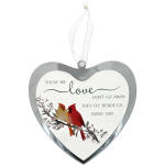 Heart-shaped memorial ornament with two birds and a sympathy message