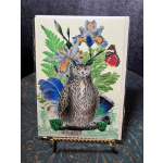 Decorative card with an owl, butterflies, and floral motifs