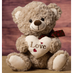 Plush teddy bear holding a heart that says Love