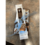Gift set of boxed chocolates tied with a blue ribbon