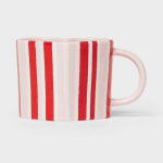 Striped ceramic mug with a handle