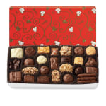 Box of assorted chocolates in a red patterned gift box